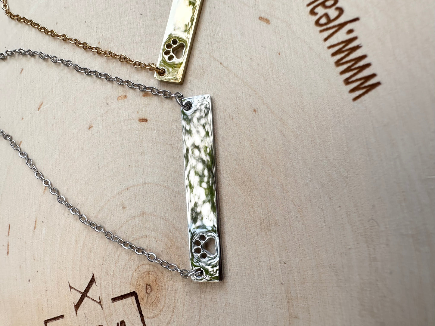 FLAT BAR OPEN PAW NECKLACE
